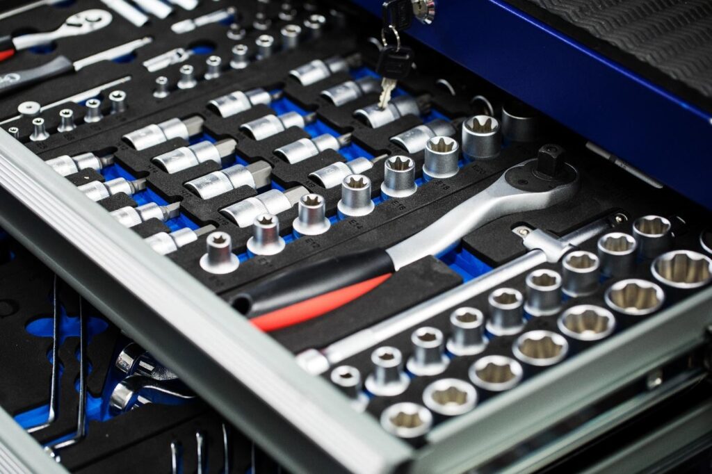 A tool box with tools in itAI-generated content may be incorrect.